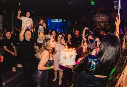Guests posing at Flashback at Time Nightclub in Costa Mesa, CA