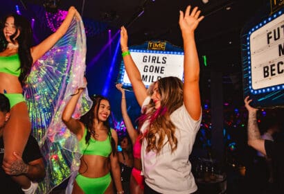 Guests posing at Flashback at Time Nightclub in Costa Mesa, CA