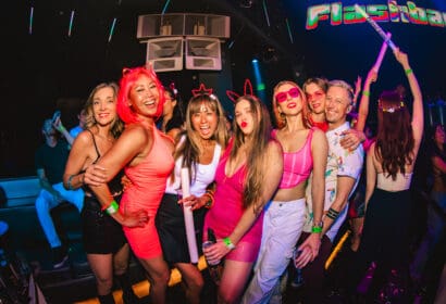 Guests posing at Flashback at Time Nightclub in Costa Mesa, CA