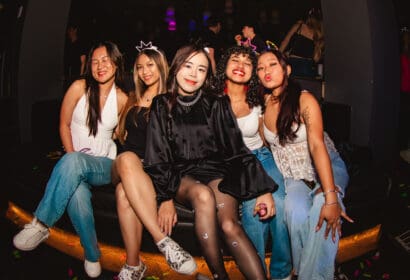 Guests posing at Flashback at Time Nightclub in Costa Mesa, CA