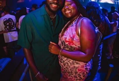 Guests posing at Mike Sherm at Time Nightclub in Costa Mesa, CA