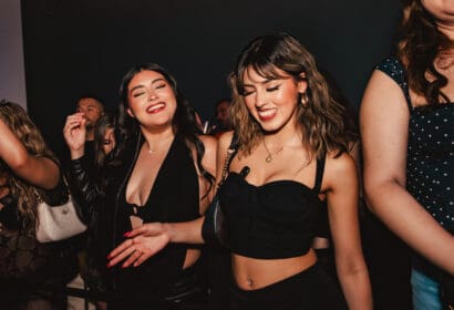 Guests posing at Mike Sherm at Time Nightclub in Costa Mesa, CA