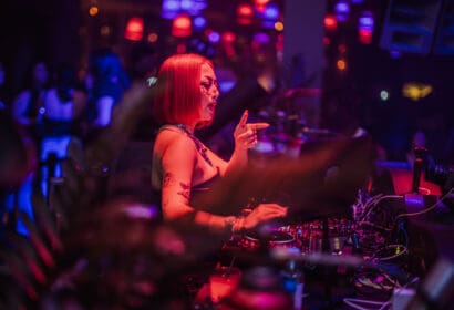 Bella Fiasco posing at Leon Thomas at Time Nightclub in Costa Mesa, CA