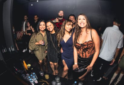 Guests posing at DJ Pauly D at Time Nightclub in Costa Mesa, CA