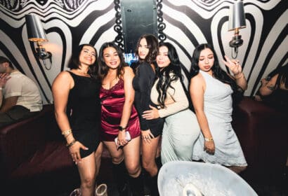 Guests posing at DJ Pauly D at Time Nightclub in Costa Mesa, CA