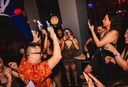 Guests posing at Ne-yo at Time Nightclub in Costa Mesa, CA