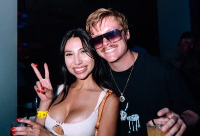 Guests posing at Larry June at Time Nightclub in Costa Mesa, CA