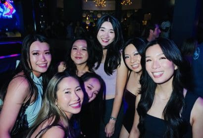 Guests posing at Boombox Cartel at Time Nightclub in Costa Mesa, CA