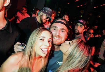 Guests posing at Boombox Cartel at Time Nightclub in Costa Mesa, CA