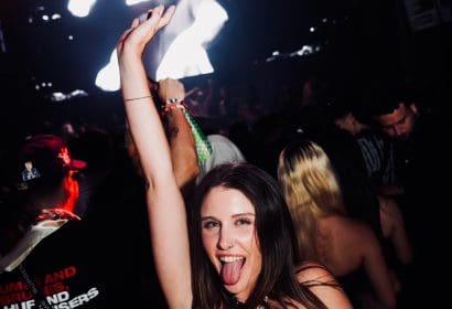 Guests posing at Boombox Cartel at Time Nightclub in Costa Mesa, CA