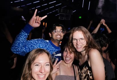 Guests posing at Boombox Cartel at Time Nightclub in Costa Mesa, CA